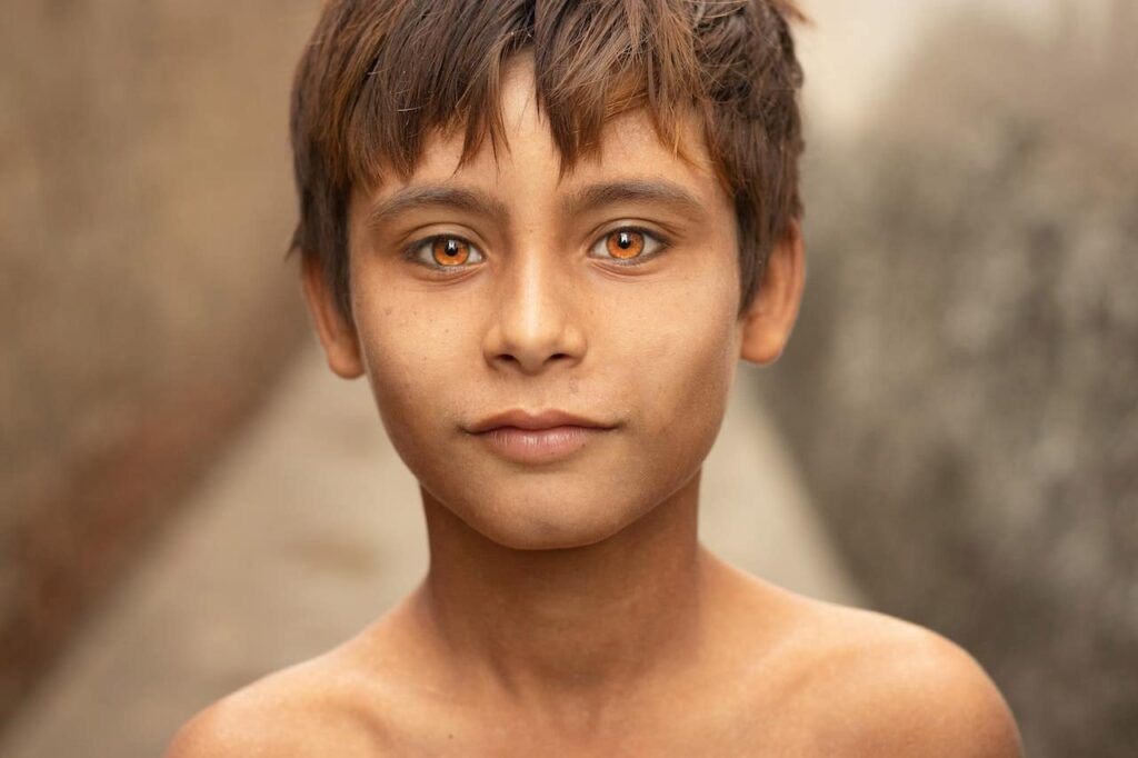 A boy with amber eyes