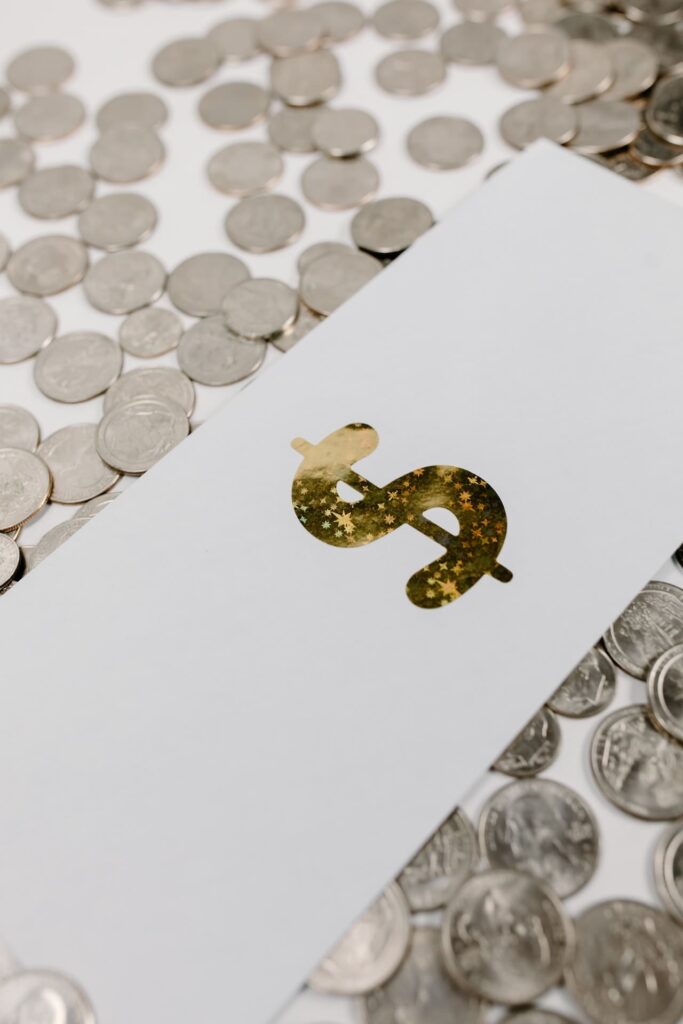 A dollar sign surrounded by coins