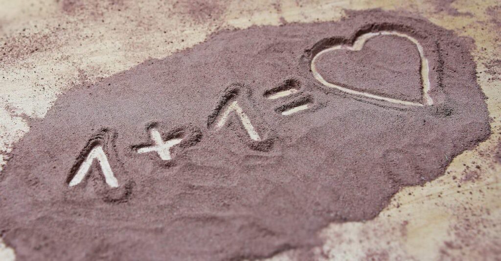 1 1= heart written in sand