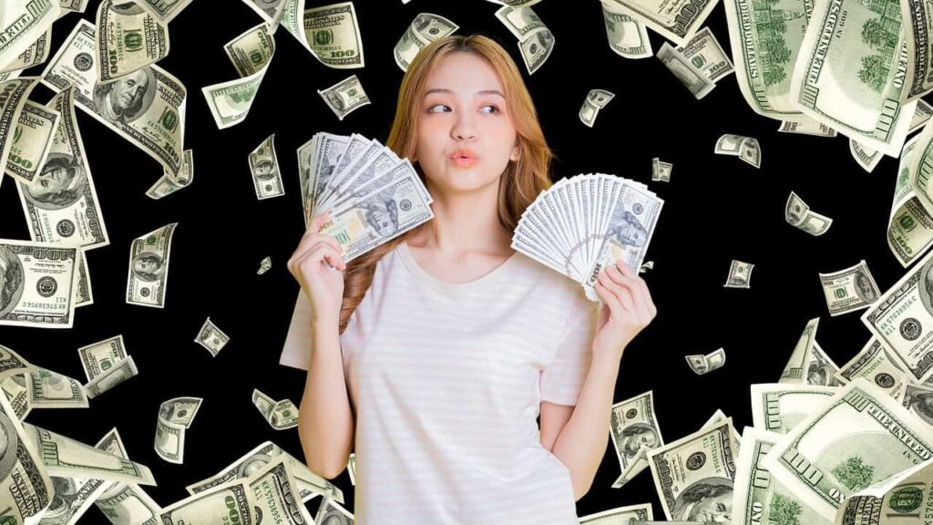 Asian woman surrounded by dollar bills