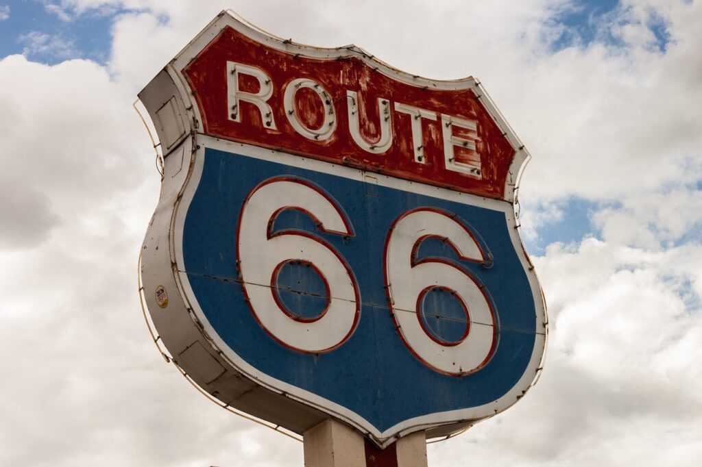 Route 66 sign against a blue sky