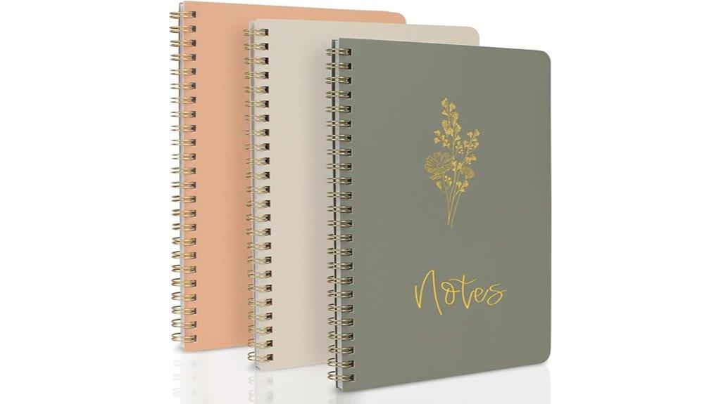 three spiral bullet journals
