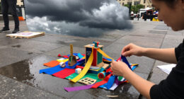Art In Odd Places Participants Seek Utopia Under Dark Clouds